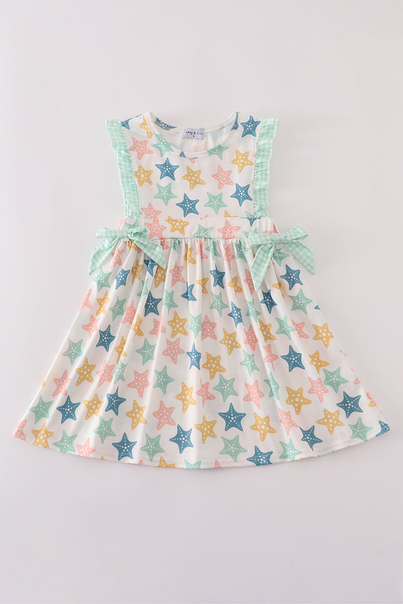 Vestido con volantes y lazo de concha azul