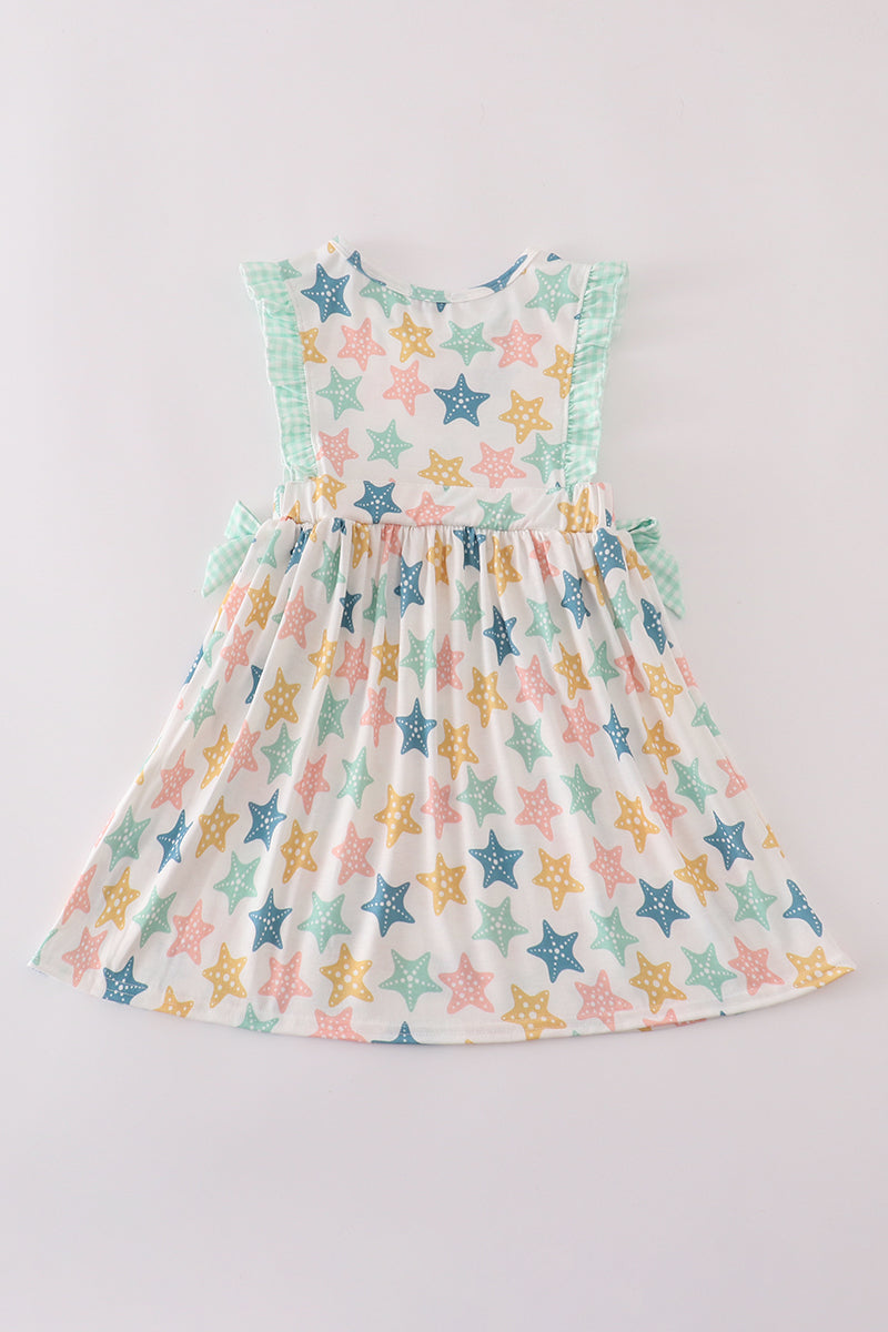 Vestido con volantes y lazo de concha azul