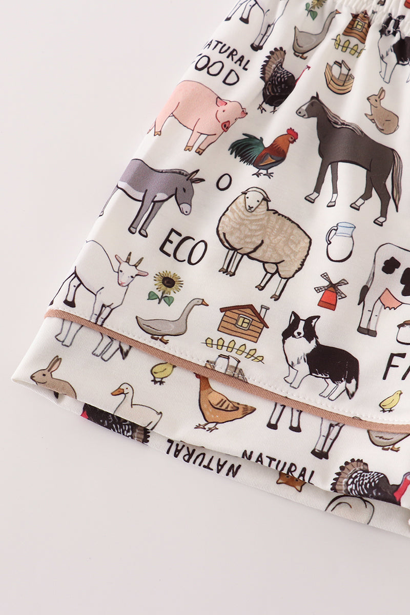 Conjunto de pijama beige para niño de granja