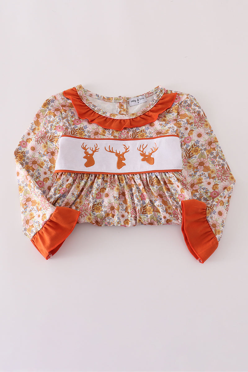 Floral dress with deer embroidery on a white background