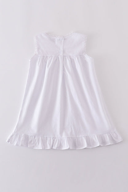 Vestido con volantes y bordado floral blanco de primera calidad