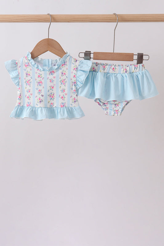 Blue Floral Ruffle 2-Piece Girls Swimsuit. A vibrant blue floral print, playful ruffle detailing, and a coordinated bikini top and bottom make this set the perfect combination of cute and comfortable for beach days, pool parties, and summer vacation getaways.
Vibrant blue floral print — a fresh, summery pattern full of color and energy
Ruffle detailing — playful, feminine accents that add charm to every splash
Coordinated 2-piece set — matching top and bottom 