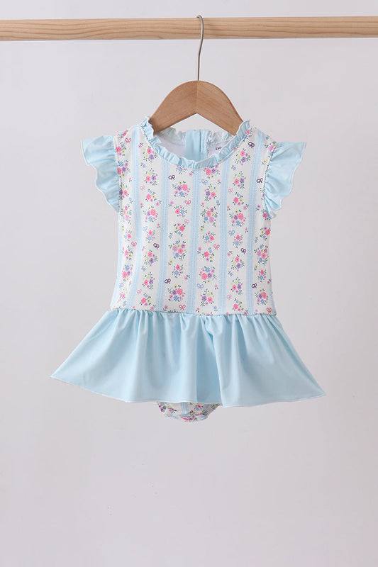Floral blue ruffle girls swimsuit. Vibrant blue floral print — a fresh, playful pattern with a touch of vintage charm
Ruffle detailing — delicate ruffles that add movement and feminine dimension
Classic one-piece silhouette — reliable coverage and flattering support for all-day wear
UPF 50+ sun protection — blocks 98% of harmful UV rays for safe, carefree play
Stretchy, quick-dry fabric — 88.5% Polyester, 11.5% Spandex for all-day comfort and movement
Sizes 12M–10 Years — perfect from baby to big girl