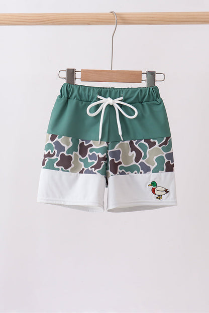 Boutique Children's Camo Duck Embroidery Boys Swim Trunks. A bold camouflage pattern paired with playful duck embroidery detailing delivers the perfect mix of outdoor edge and whimsical charm — conversation-starting swimwear that's as fun as it is functional.