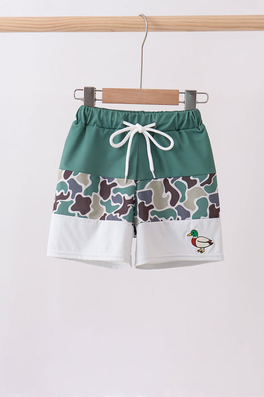 Boutique Children's Camo Duck Embroidery Boys Swim Trunks. A bold camouflage pattern paired with playful duck embroidery detailing delivers the perfect mix of outdoor edge and whimsical charm — conversation-starting swimwear that's as fun as it is functional.