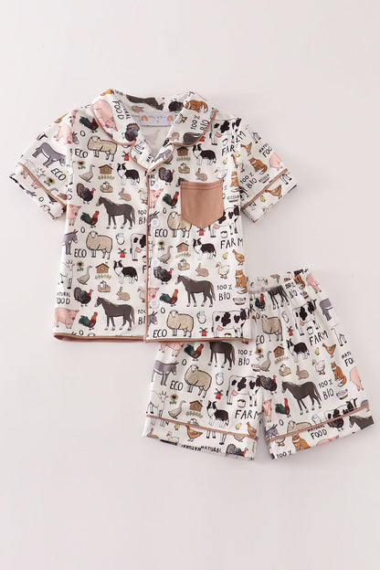 Conjunto de pijama beige para niño de granja