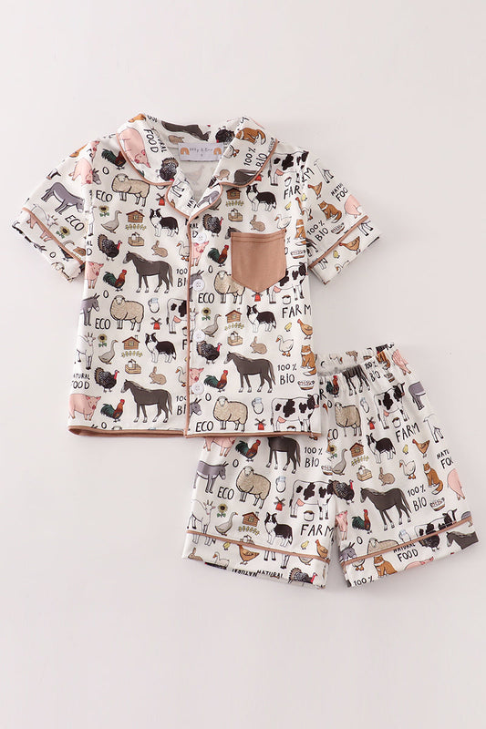 Conjunto de pijama beige para niño de granja