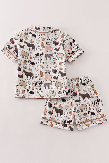 Conjunto de pijama beige para niño de granja