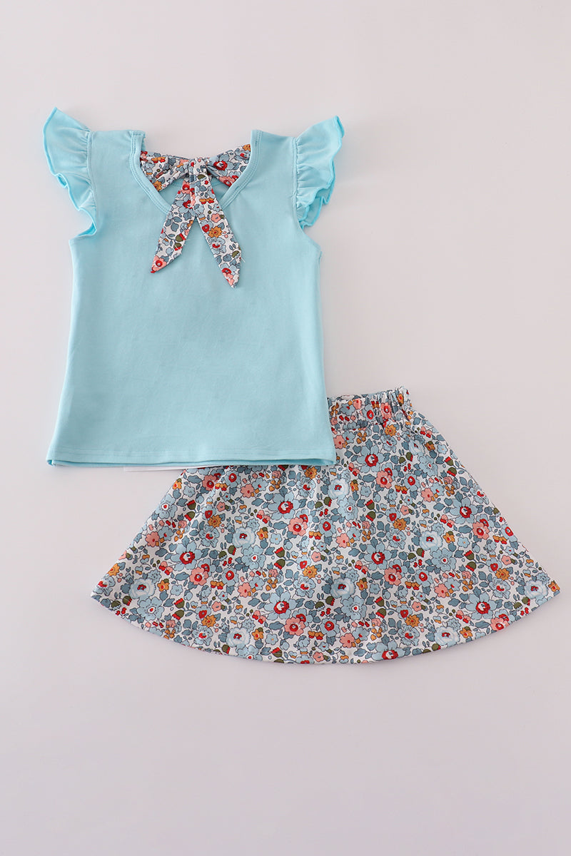 Conjunto de falda pantalón deportiva con aplique de lazo floral azul