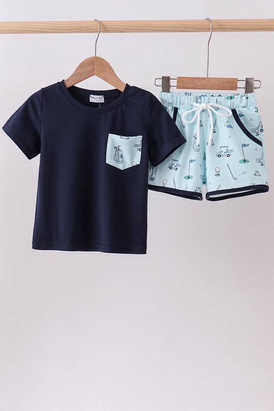 Boutique Navy Golf Print Shorts Set for Boys delivers classic style with all-day comfort. A polished navy base with a fun golf-themed print, a coordinated top and shorts, and soft stretch fabrics make this set perfect for the course, casual outings, and everything in between.