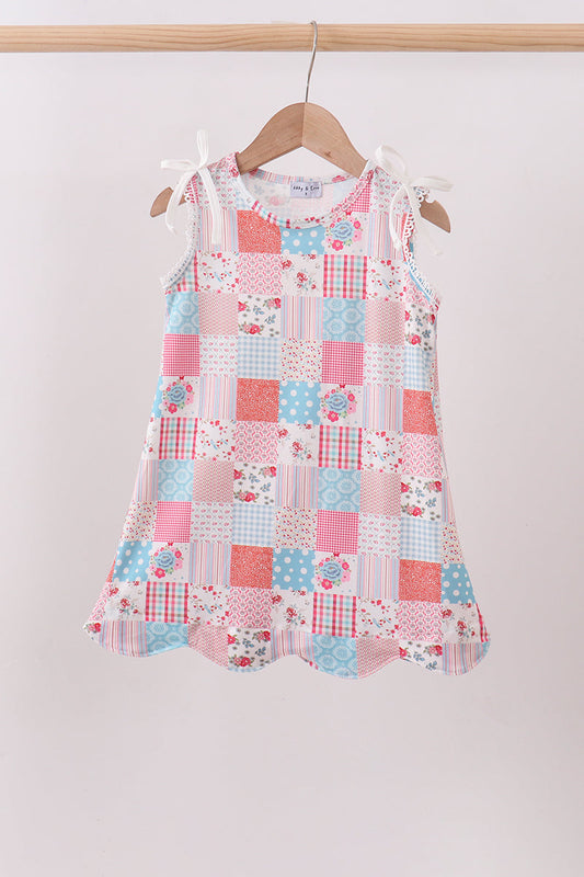 Children's clothing boutique Pink Floral Patchwork Girls Dress. Mixed fabric panels featuring delicate floral prints come together in a charming patchwork design that's full of personality — perfect for casual gatherings, weekend outings, family photos, and every day that deserves something special.