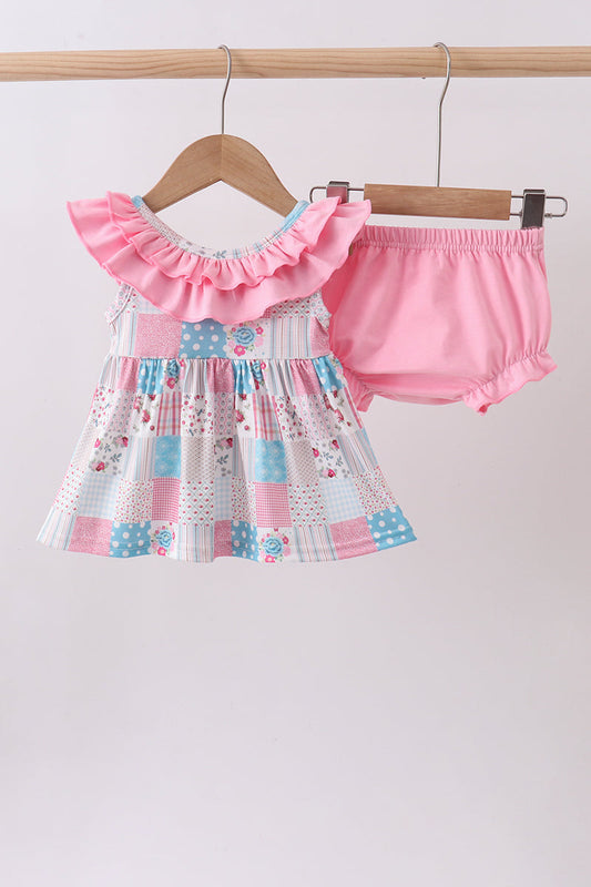 Pink Patchwork Floral Ruffle Baby Girl Bloomer Set. A whimsical mix of coordinating floral prints in a charming patchwork design, delicate ruffles on the bloomers, and soft, comfortable fabrics make this set the perfect choice for everyday wear, playdates, and special occasions alike.