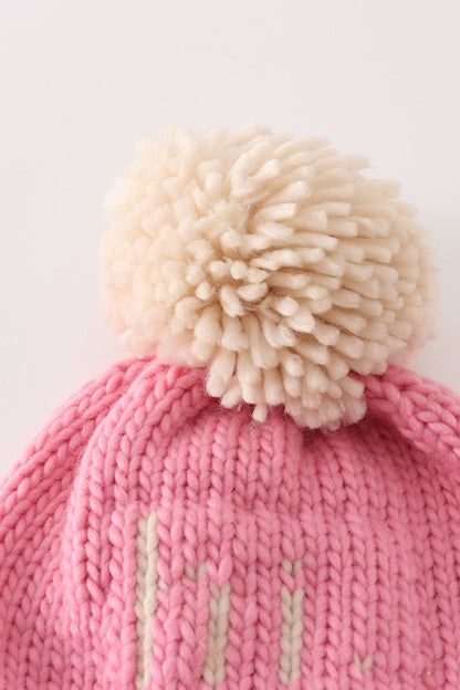 Gorro de punto con pompón rosa