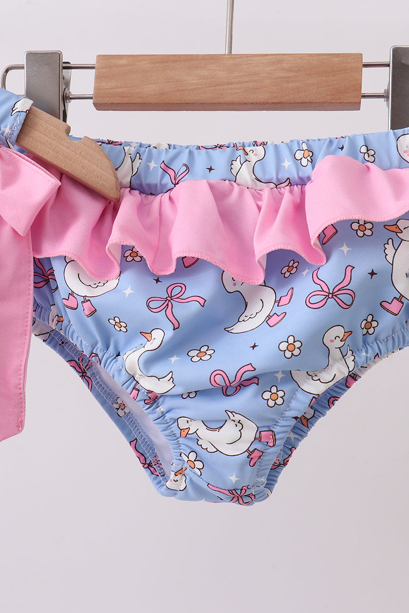 Children's underwear with duck and bow pattern on a hanger