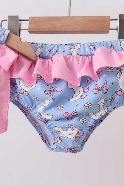 Children's underwear with duck and bow pattern on a hanger