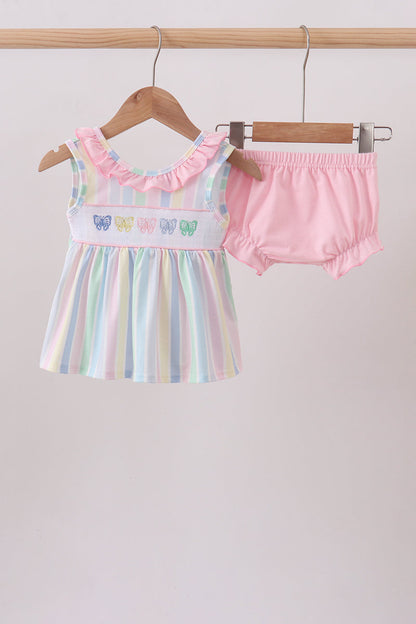 children's boutique clothing. Rainbow Stripe Butterfly Smocked Ruffle Baby Girl Bloomer Set. Delicate butterfly appliqués, intricate smocking details, vibrant rainbow stripes, and ruffled bloomers come together in a vintage-inspired silhouette that's as charming as it is comfortable — perfect for warm-weather play and special occasions alike.