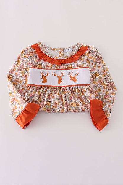 Floral dress with deer embroidery on a white background