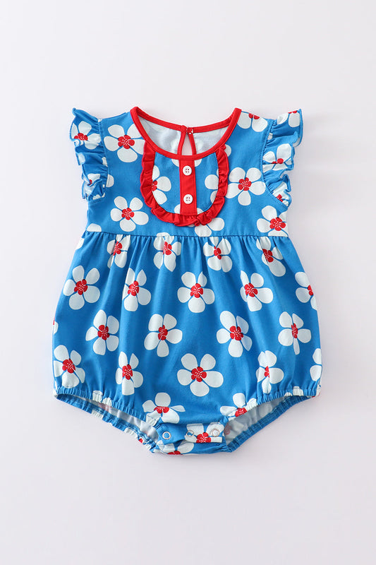 Burbuja con volantes y estampado floral en azul platino y blanco para niña