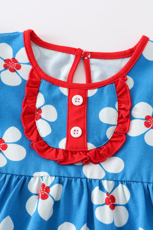 Burbuja con volantes y estampado floral en azul platino y blanco para niña