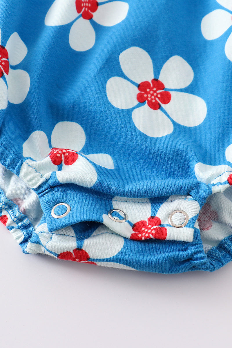 Burbuja con volantes y estampado floral en azul platino y blanco para niña