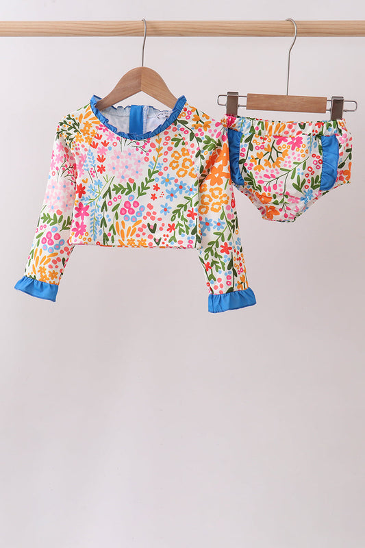 Children's clothing boutique. Summer Floral Print Ruffle 2-Piece Girls Swimsuit. A vibrant floral design that captures the essence of warm-weather style, playful ruffles, and a coordinated top and bottom make this set the perfect combination of feminine and fun for beach days, pool parties, and vacation getaways.