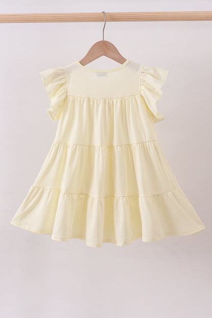 Vestido escalonado con lentejuelas cruzadas amarillas